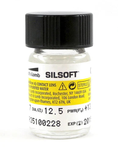 Silsoft contact lens solution bottle with black cap on a white background